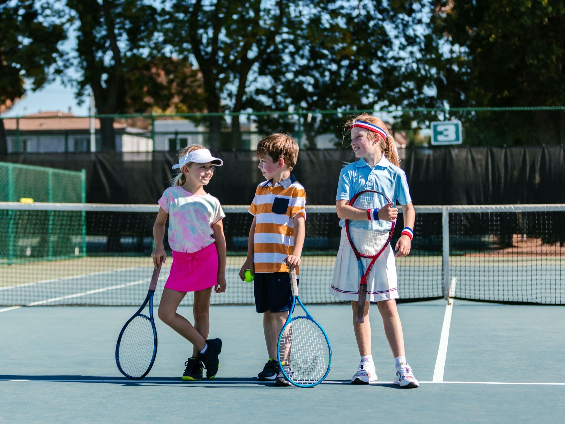 Kids playing tennis
